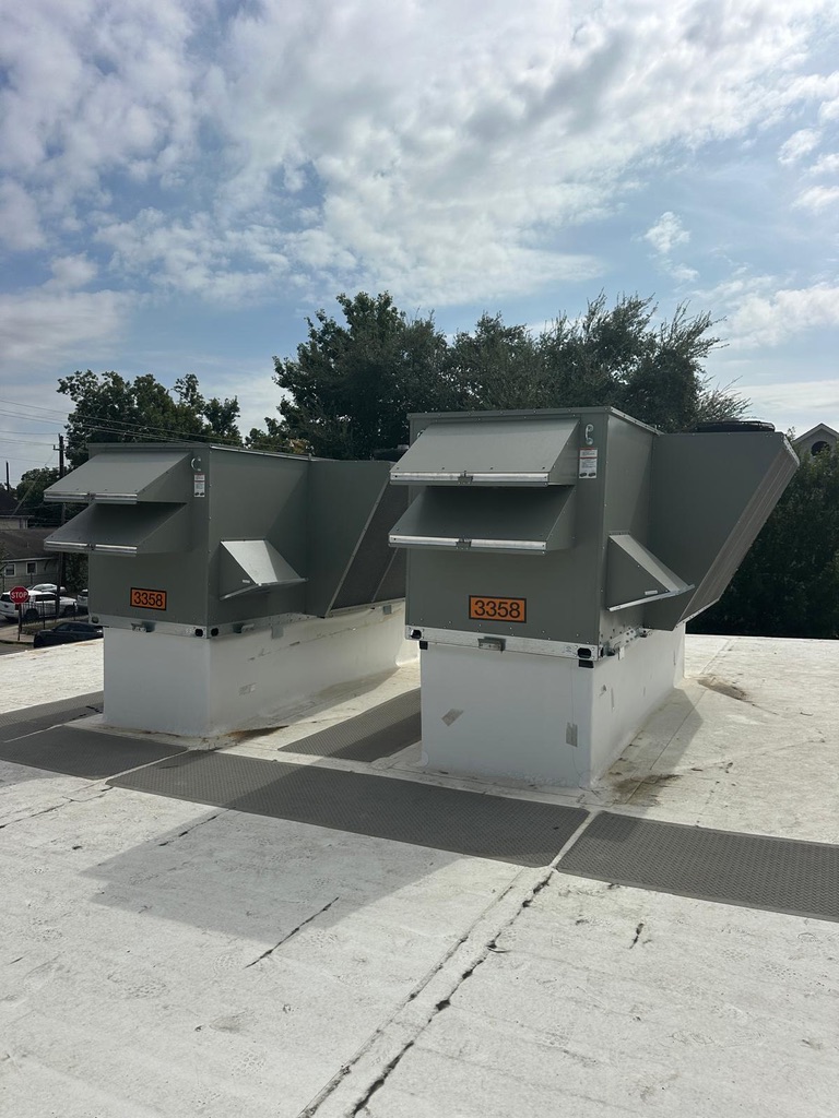Commercial rooftop HVAC units maintained by Sum Win